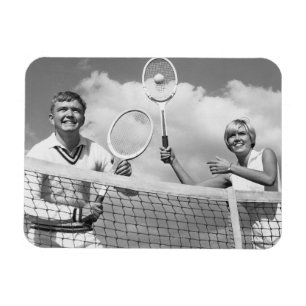 Man och kvinna som leker tennis magnet