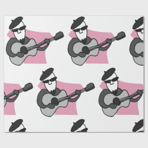 Man som bär beret spelar akustisk gitarr presentpapper