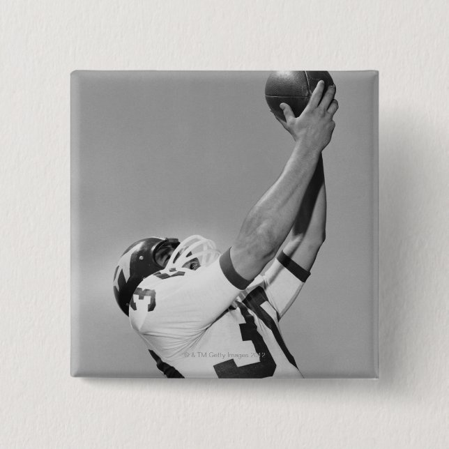 Man som leker fotboll knapp (Framsida)