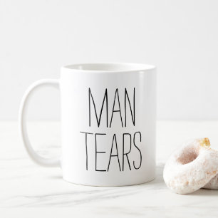 Man tårar kaffemugg