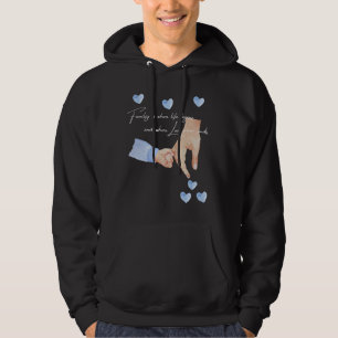 Manar Ny pappa i en pojke som håller Händer med et Hoodie