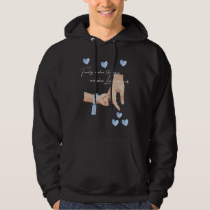 Manar Ny pappa i en pojke som håller Händer med et Hoodie