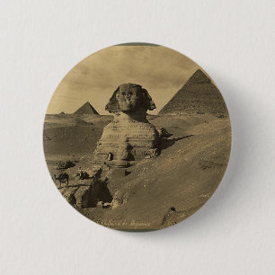 Manar och kamel på tassen av sphinxen, pyramider knapp