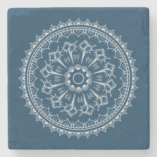 Mandala som göras av snäckskal underlägg sten