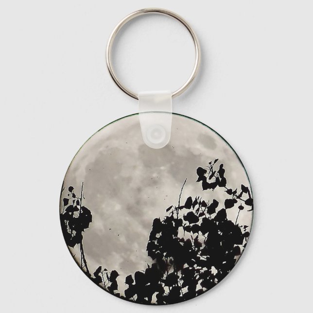 Måne bakom mörka blad nyckelring (Framsida)
