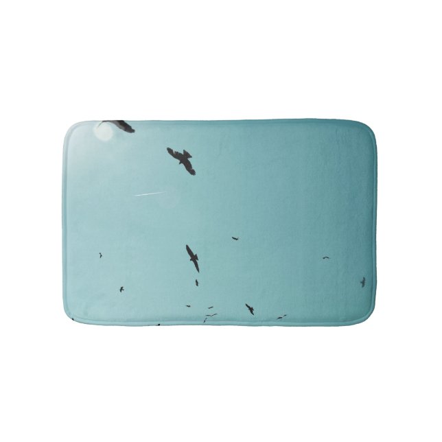 Många fåglar och en kontrast badrumsmatta (Framsidan)