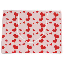 Många röda hjärtan på en söt presentväska