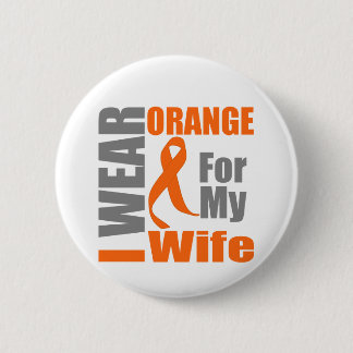 Många Sclerosis I Bära Orange Ribbon Maka Knapp
