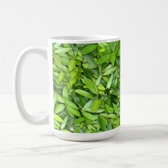 Många vackra gröntar lämnar    kaffemugg (Vänster)