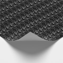 Många vitcykelsymboler på en svart bakgrund presentpapper