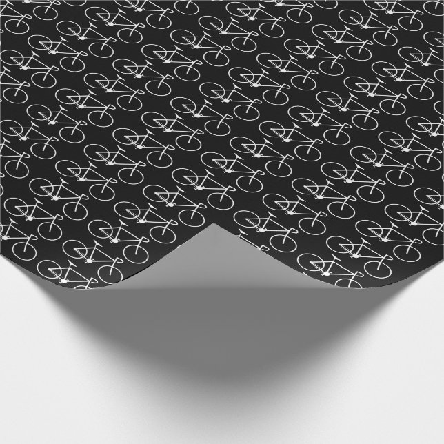 Många vitcykelsymboler på en svart bakgrund presentpapper (Hörn)