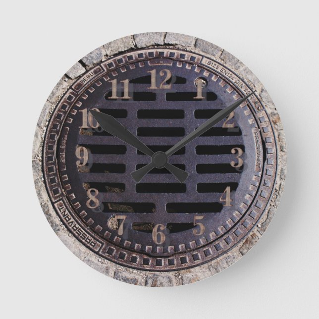 Manhålshölje och vägklocka av stensten rund klocka (Framsida)