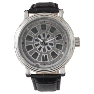 Manholen täcker 1 armbandsur
