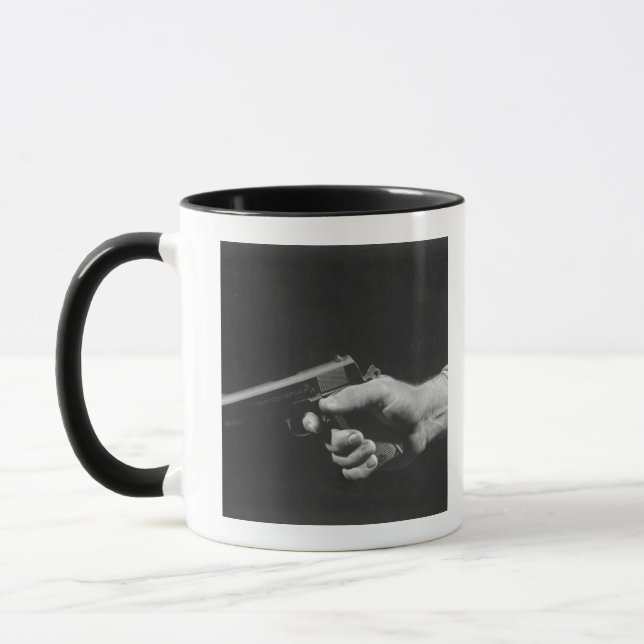 Maninnehavvapen Mugg (Vänster)