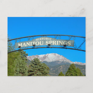 Manitou Springs Skylt som ramas in Pikes Peak, Col Vykort