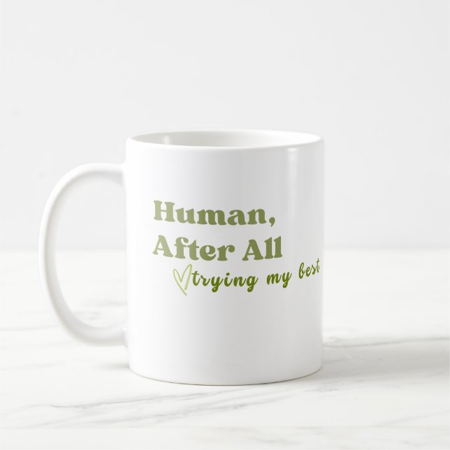 Människa trots allt, gör mitt bästa kaffemugg (Vänster)