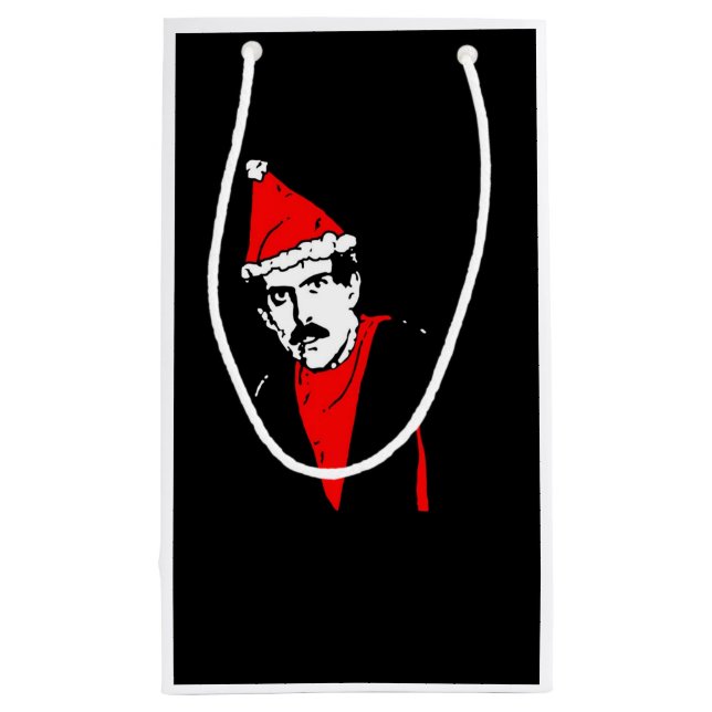 Manos går den små ledar- gåvan tillbaka hänger lös (Baksidan)