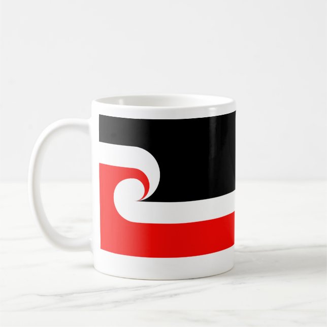Maori nyazeeländskt kaffemugg (Vänster)
