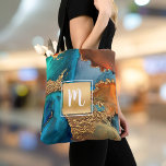 Marble water color monogram guld turkos & orange tygkasse<br><div class="desc">En glatt, faux-guld-folie med ett skript-typografi-monogram täcker till att börja med en rik, guld-vektad, turkosblå och gultens orange vattenfärgsbakgrund på eleganten, trendiget, gigantisk, modern monogram till säcken. Gör en roligt och snyggt påstående varje gång du användor den. En underbar gåva till en vän, förutom dig själv! Skriv bara in det...</div>