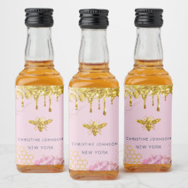 Märkning av biets logotyp och rosa hydrangea liquo spritflaskor etikett