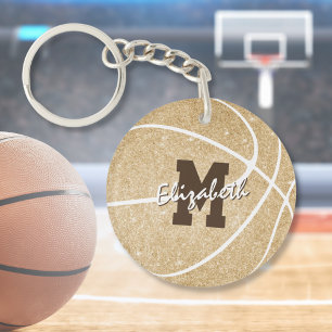 märkre för guld med monogrammerad basketsäck