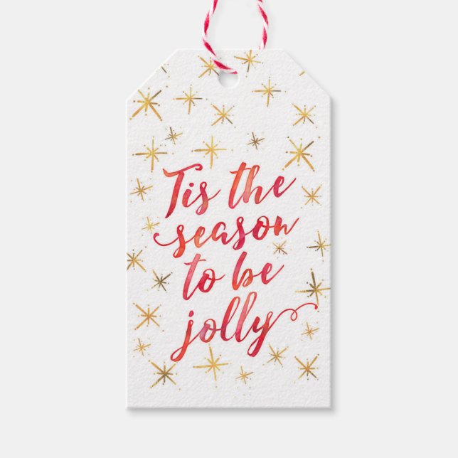 Märkre för snöflingor i guld under säsongen presentetikett (Framsidan)