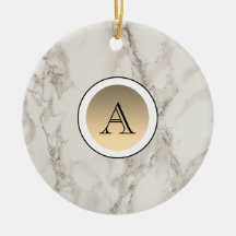 Marmor och elegant initial i guld