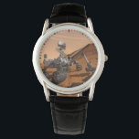 Mars Science Laboratory Curiosity Rover. Armbandsur<br><div class="desc">Artist concept of Mars Science Laboratory Curiosity rover, a mobile robot for investigating Mars' past or present ability to sustain microbial life. In this picture, the rover examines a rock on Mars with a set of tools at the end of the rover's arm, which extends about 7 feet. Two instruments...</div>