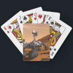 Mars Science Laboratory Curiosity Rover. Casinokort<br><div class="desc">Artist concept of Mars Science Laboratory Curiosity rover, a mobile robot for investigating Mars' past or present ability to sustain microbial life. In this picture, the rover examines a rock on Mars with a set of tools at the end of the rover's arm, which extends about 7 feet. Two instruments...</div>