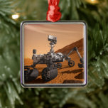 Mars Science Laboratory Curiosity Rover. Julgransprydnad Metall<br><div class="desc">Artist concept of Mars Science Laboratory Curiosity rover, a mobile robot for investigating Mars' past or present ability to sustain microbial life. In this picture, the rover examines a rock on Mars with a set of tools at the end of the rover's arm, which extends about 7 feet. Two instruments...</div>