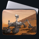Mars Science Laboratory Curiosity Rover. Laptop Fodral<br><div class="desc">Artist concept of Mars Science Laboratory Curiosity rover, a mobile robot for investigating Mars' past or present ability to sustain microbial life. In this picture, the rover examines a rock on Mars with a set of tools at the end of the rover's arm, which extends about 7 feet. Two instruments...</div>