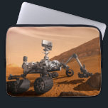 Mars Science Laboratory Curiosity Rover. Laptop Fodral<br><div class="desc">Artist concept of Mars Science Laboratory Curiosity rover, a mobile robot for investigating Mars' past or present ability to sustain microbial life. In this picture, the rover examines a rock on Mars with a set of tools at the end of the rover's arm, which extends about 7 feet. Two instruments...</div>