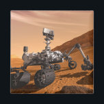 Mars Science Laboratory Curiosity Rover. Magnet<br><div class="desc">Artist concept of Mars Science Laboratory Curiosity rover, a mobile robot for investigating Mars' past or present ability to sustain microbial life. In this picture, the rover examines a rock on Mars with a set of tools at the end of the rover's arm, which extends about 7 feet. Two instruments...</div>