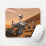 Mars Science Laboratory Curiosity Rover. Musmatta<br><div class="desc">Artist concept of Mars Science Laboratory Curiosity rover, a mobile robot for investigating Mars' past or present ability to sustain microbial life. In this picture, the rover examines a rock on Mars with a set of tools at the end of the rover's arm, which extends about 7 feet. Two instruments...</div>