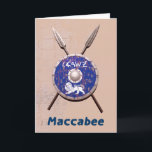 MASKINVARA OCH HASTIGHETER HELGKORT<br><div class="desc">En bild av Maccabees sköld och två spjut på en vägg. Nötkreatur bär och rostar, men kan fortfarande användas. Skölden är skriven med en lejon text som lyder "Yisrael" (Israel) i alfabetet Paleo-Hebrew. Även den engelska texten där "Maccabee" står visas. Mackorna var judiska rebeller som befriade Judea från det självstyrande...</div>
