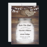 Mason Jar Rustic Country Wood Burlap Wedding Spara Datumet<br><div class="desc">Rustic country wedding save the date card featuring a mason jar,  string lights and burlap hearts on a rustic wood background.</div>