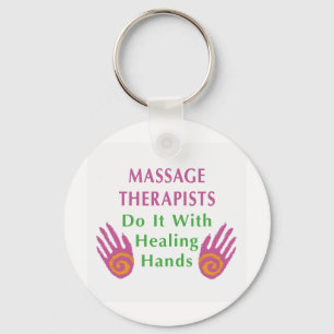 Massageterapeuter gör det med händer som läker nyckelring