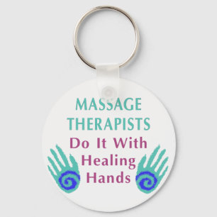 Massageterapeuter gör det med händer som läker nyckelring