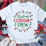 Matchande julkussin Crew T Shirt<br><div class="desc">Vad är det för bättre sätt att föra ihop din familj denna jul än med en uppsättning roligtar som passar familjens kusin till julskjortor? Med det mysiga talesättet "julkusin besättning", tillsammans med året, och den lysande, festliga röda och grönt julsträng ljus, kommer din familj att se underbar ut när du...</div>