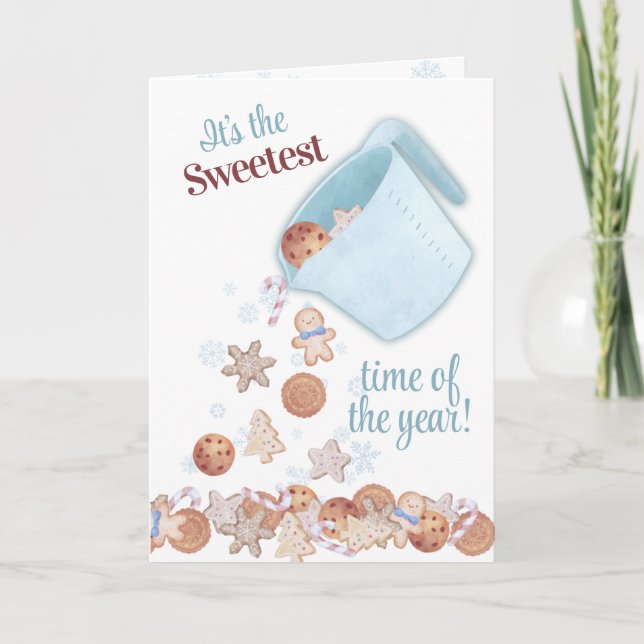 Mätning av kopp genom att hälla upp julkakor som b helgkort (Framsida)