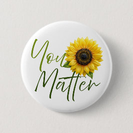 Matter med solros knapp