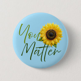Matter med solros knapp