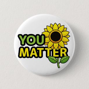 Matter med solros knapp