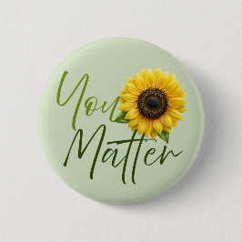 Matter med solros knapp