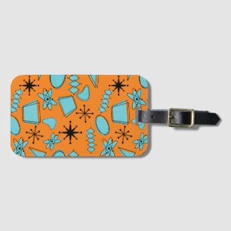 MCM atomformer turkos på Orange Bagagebricka