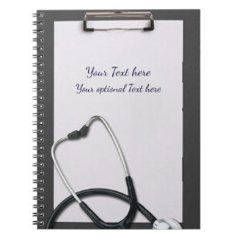 Medicinsk grå klippbräda med stetoskop anteckningsbok