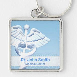 Medicinsk vit 3D Caduceus Blue Design Fyrkantig Silverfärgad Nyckelring