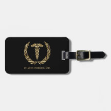 Medicinskt symbol - svart och guld