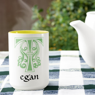 Medieval botanisk dekorationskapital T Mugg