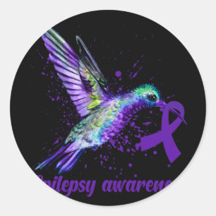 Medvetenhet om hummingbird Lila Ribbon Epilepsy Må Runt Klistermärke